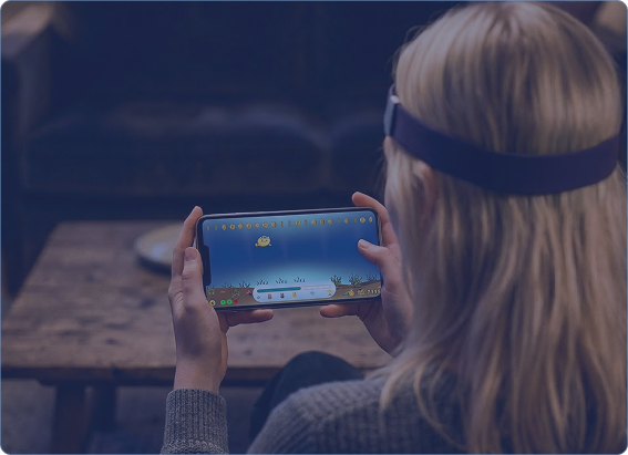Participant using EEG headband with BrainGoMo mobile app
